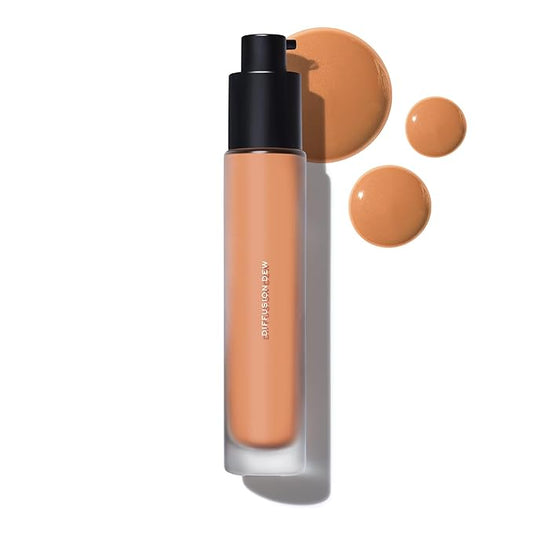 MAKE Beauty Diffusion Dew Skin Tint. Sheer to Medium Coverage Radiant Finish. Blurring, Smoothing, and Brightening for Glowing Complexion. Enhanced with Niacinamide and Adenosine. Suede 12