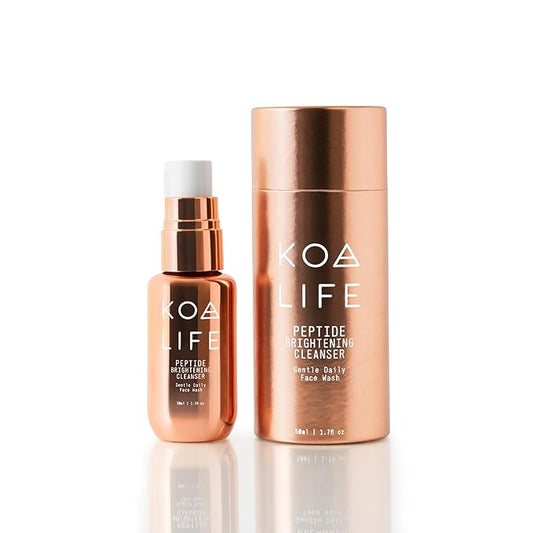 KOA LIFE Daily Gentle Peptide Facial Cleanser. Hydrates and anti-ages. In a metallic copper glass pump bottle and metallic copper outer cylinder carton